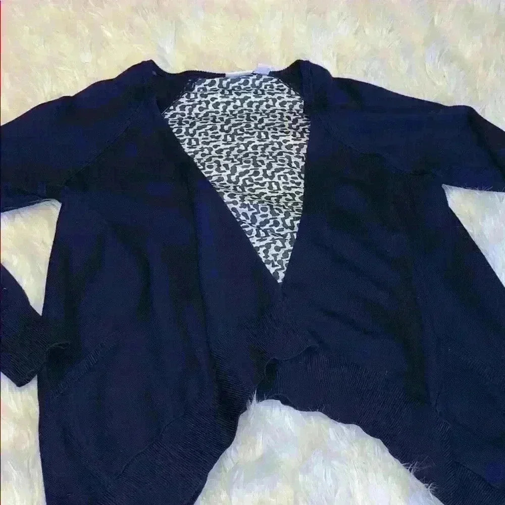 Cato blue cardigan with print in the back